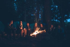 people having a bonfire: The Frugal Traveler